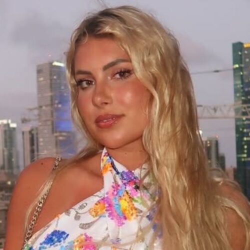 Swim Star Andreea Dragoi Sunbathes in Scarlet, Leaves Zodiac Sizzling