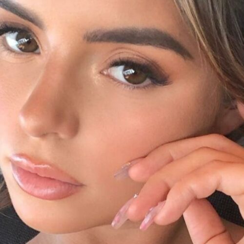 Demi Rose’s Unzipped Swimsuit and Mirror Pose: What’s She Really Hiding Behind That Reflection?