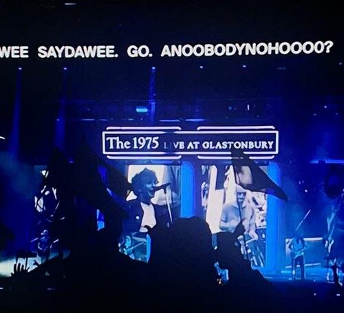 Glastonbury Fans Absolutely Lose It Over The 1975’s Bizarre Stage Moment—Is Mercury in Retrograde or What?
