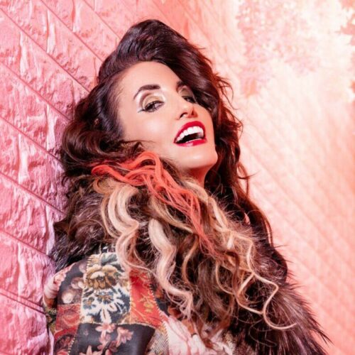 Laura Bryna’s Glitter Era at CMA Fest: Why She's Breaking All the Rules—and Astrology Says She's Just Getting Started