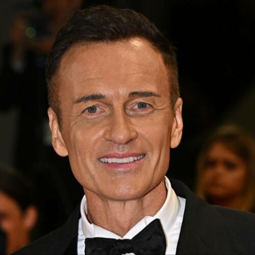 Julian McMahon’s Sudden Death at 56 Sparks Wife’s Heartbreaking Confession — What They’re Hiding Will Shock You!