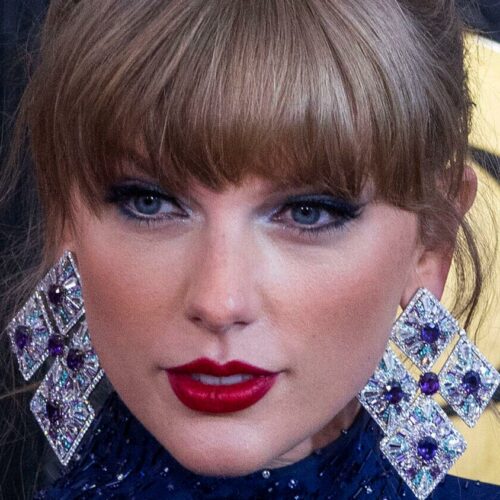 Taylor Swift’s Braless Dress Sparks Backhanded Compliment—But Is the Real Drama Written in the Stars?