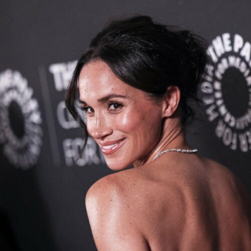 Did Meghan Markle Just Laugh at a Tripping Model or Did Fashion Week Witness a Royal Fashion Faux Pas? Find Out!