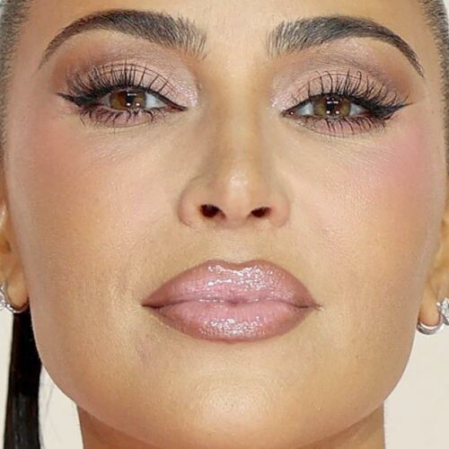 Kim K’s Bare-It-All Trench Moment: Is Venus Aligning with Vogue or Just Hot Air?