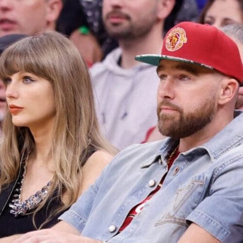 "Is Travis Kelce's Beer-Swigging Antics at the Cavs Game a Major Red Flag? Taylor Swift's Reaction Says It All!"