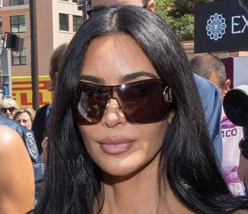"Kim Kardashian Hits the Gas at Grand Prix: Did Her Outfit Steal the Show or the Spotlight from Lewis Hamilton?"