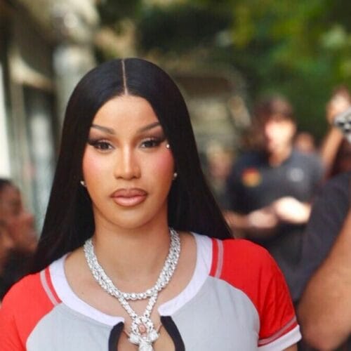 "Cardi B's Bold Top-Down Moment: Empowerment or Just Another Celebrity Stunt? Find Out What Has Everyone Talking!"
