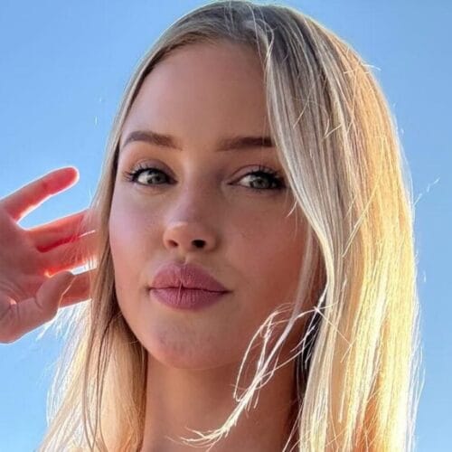 "Tana Rain's Floral Bikini Reveal: Is She Channeling Venus or Just Making Waves?"