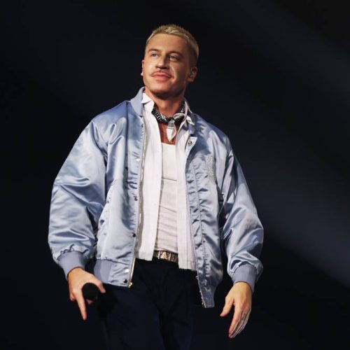 "Ed Sheeran's Money Mates Hit Back: Will Macklemore's Million-Dollar Palestine Dare Turn Into a Star-Studded Charity Showdown?"