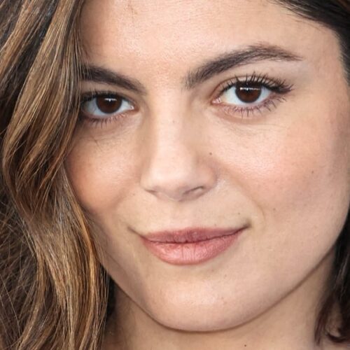 "Monica Barbaro's Plunging Bikini Sparks Speculation: Are Those Curves Nat or Enhanced?"